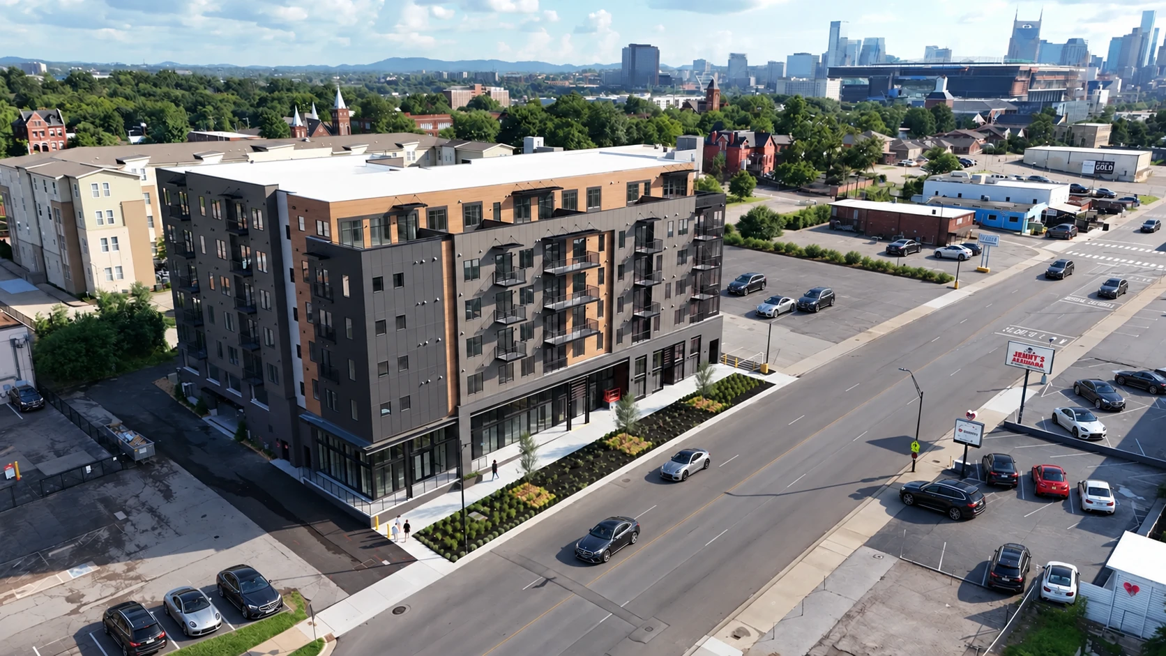 Edited aerial visualization of The Jesse on Main Street with premium vehicles and downtown Nashville in the distance